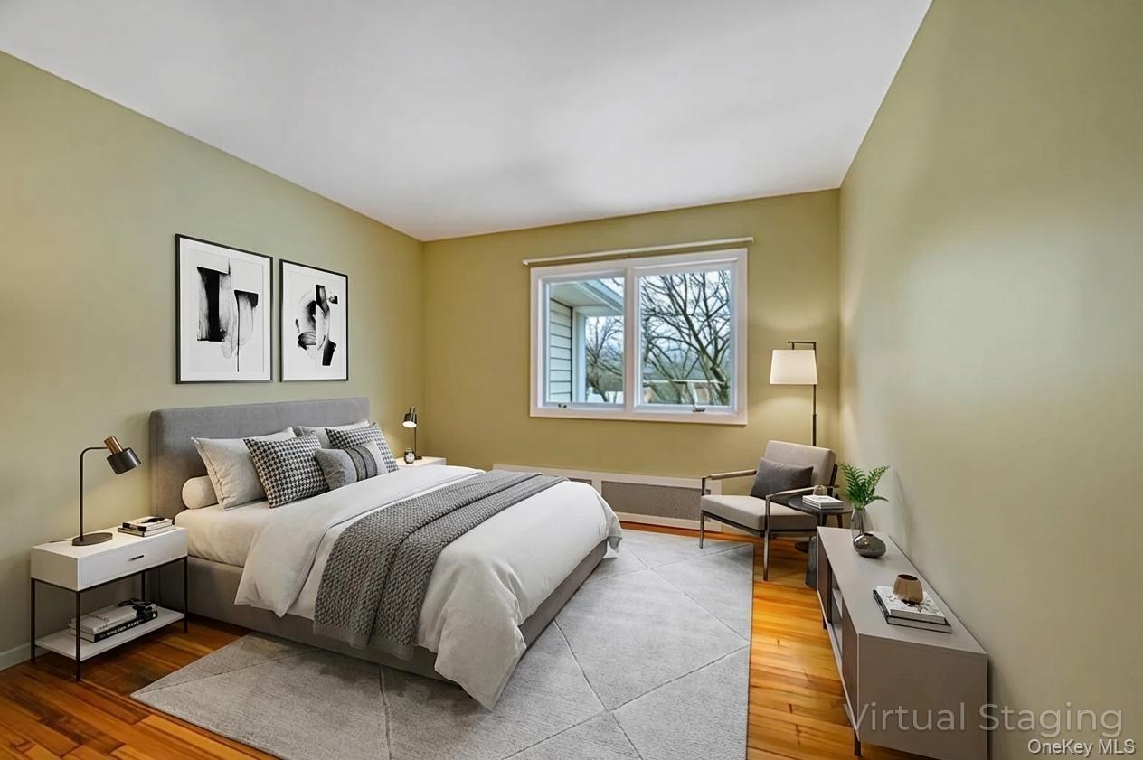 105 Browns Road Nesconset, NY 11767 - Photo 29 of 50 a bedroom with a bed and a window