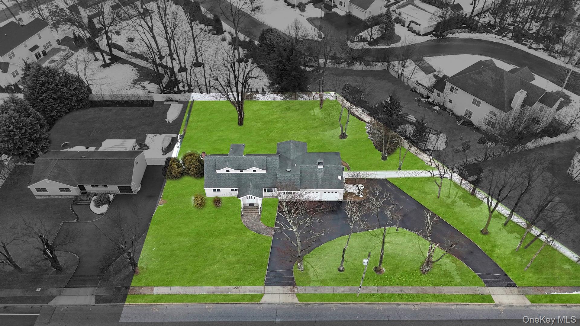 105 Browns Road Nesconset, NY 11767 - Photo 3 of 50 an aerial view of a house