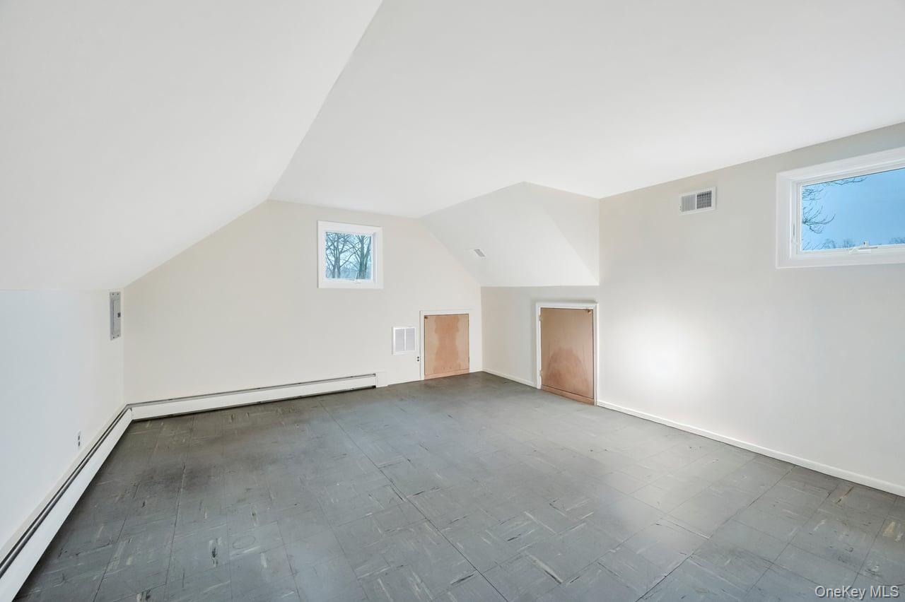 105 Browns Road Nesconset, NY 11767 - Photo 37 of 50 a view of an empty room with a window