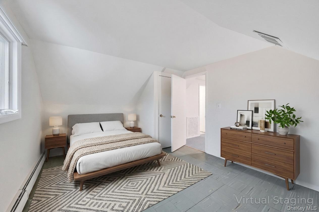 105 Browns Road Nesconset, NY 11767 - Photo 41 of 50 a bedroom with a bed and a dresser