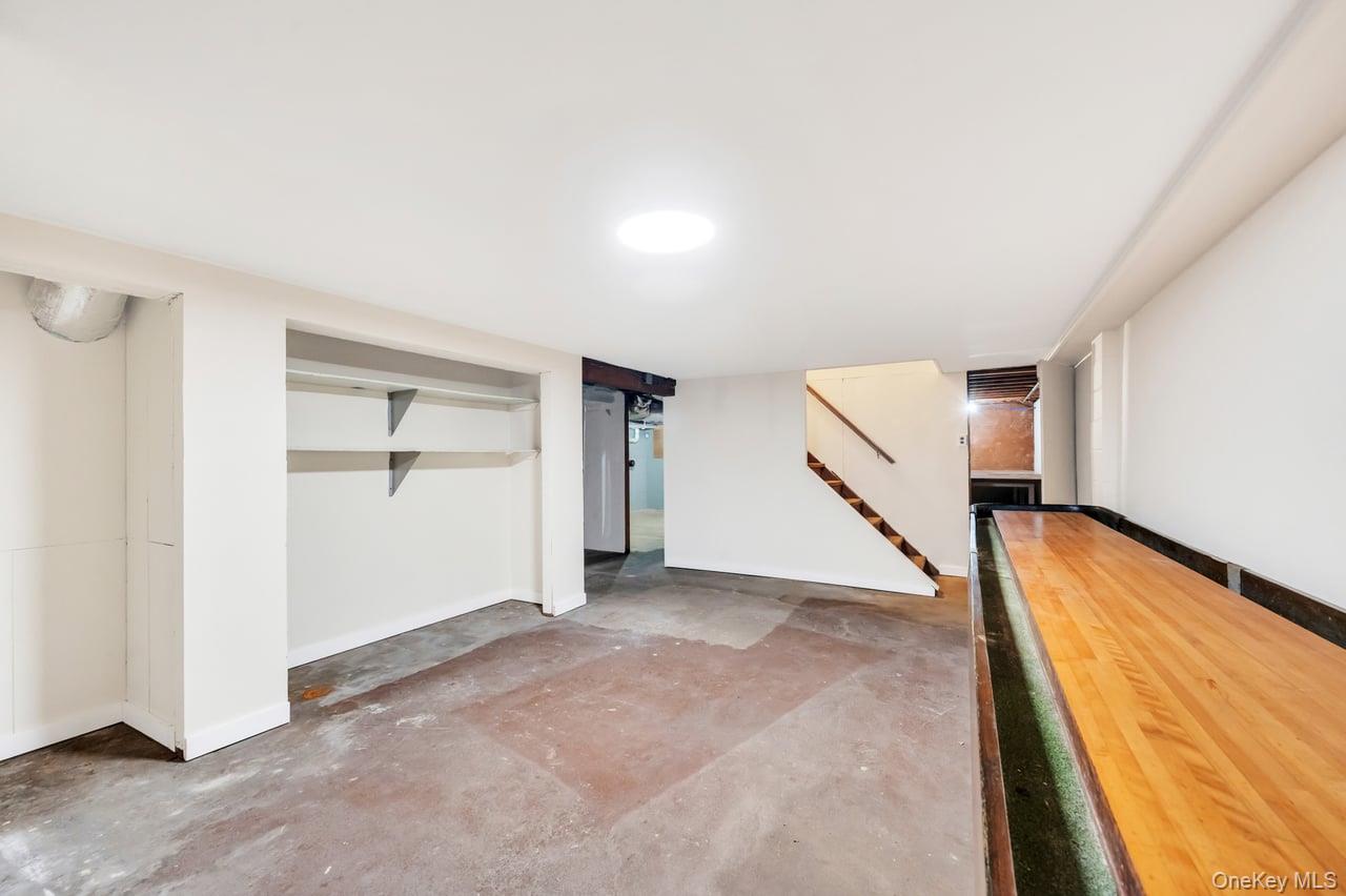 105 Browns Road Nesconset, NY 11767 - Photo 46 of 50 wooden floor in an empty room with a window
