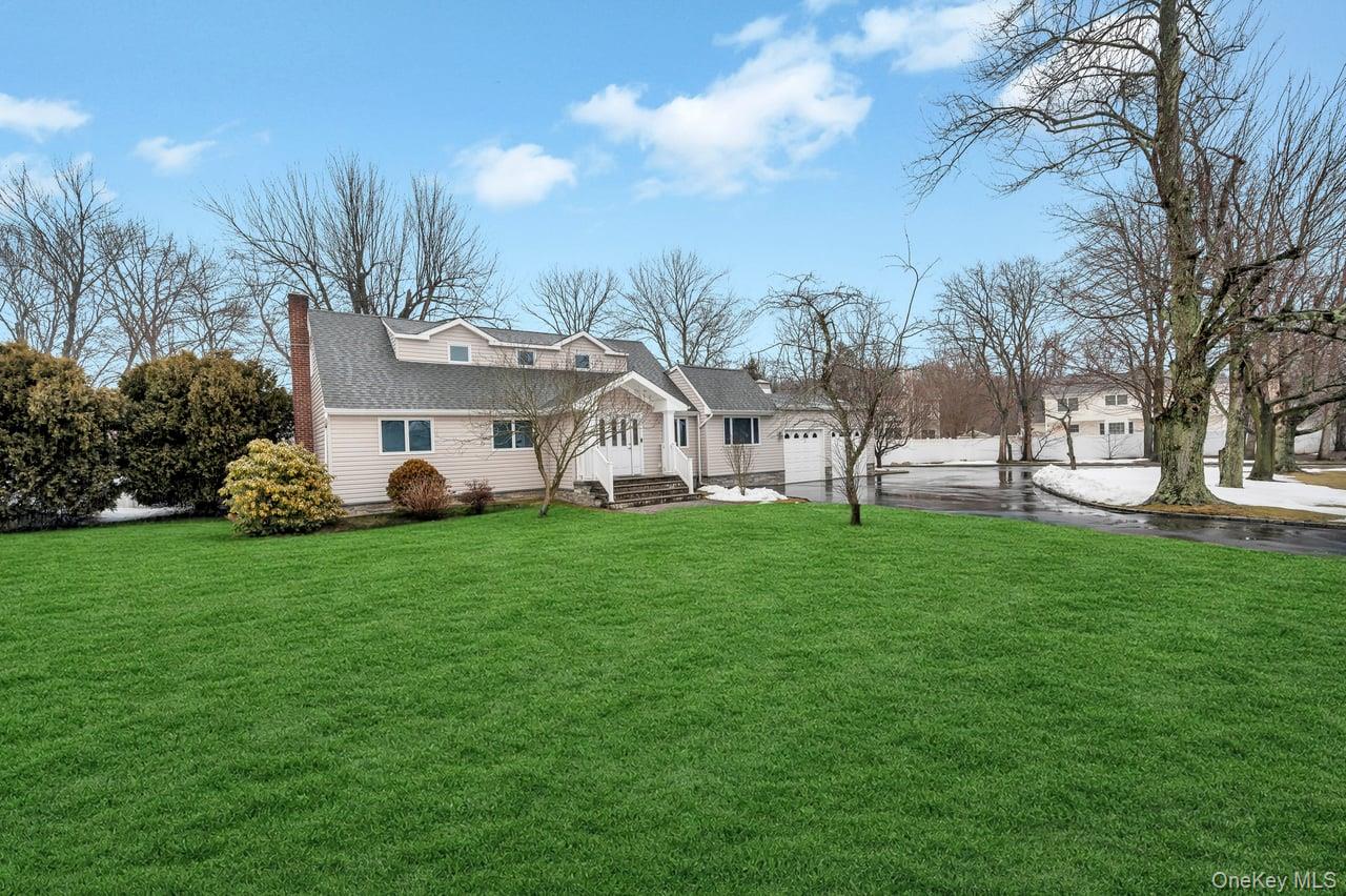 105 Browns Road Nesconset, NY 11767 - Photo 6 of 50 a view of a house with a yard