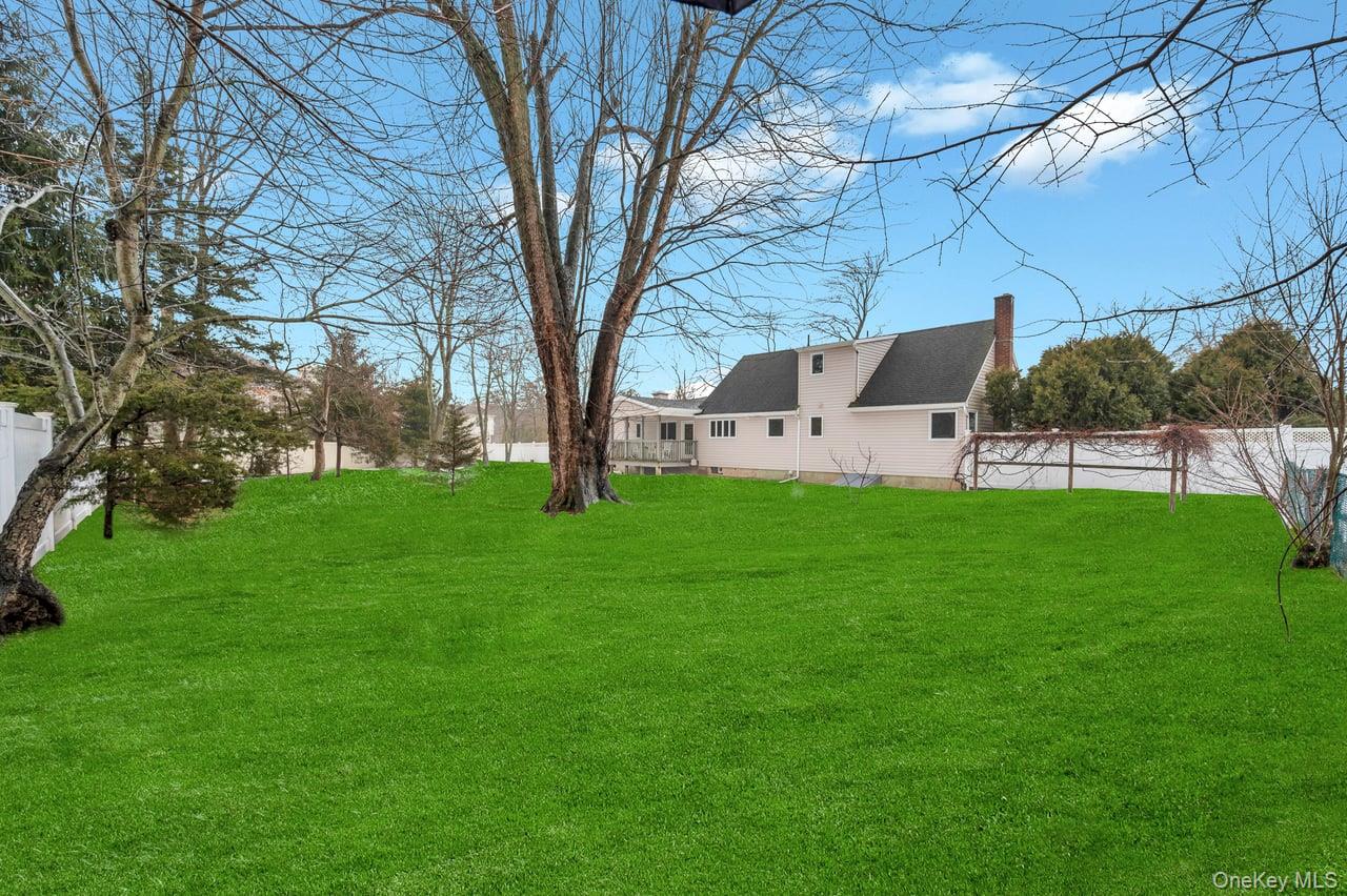 105 Browns Road Nesconset, NY 11767 - Photo 10 of 50 a view of a house with a yard
