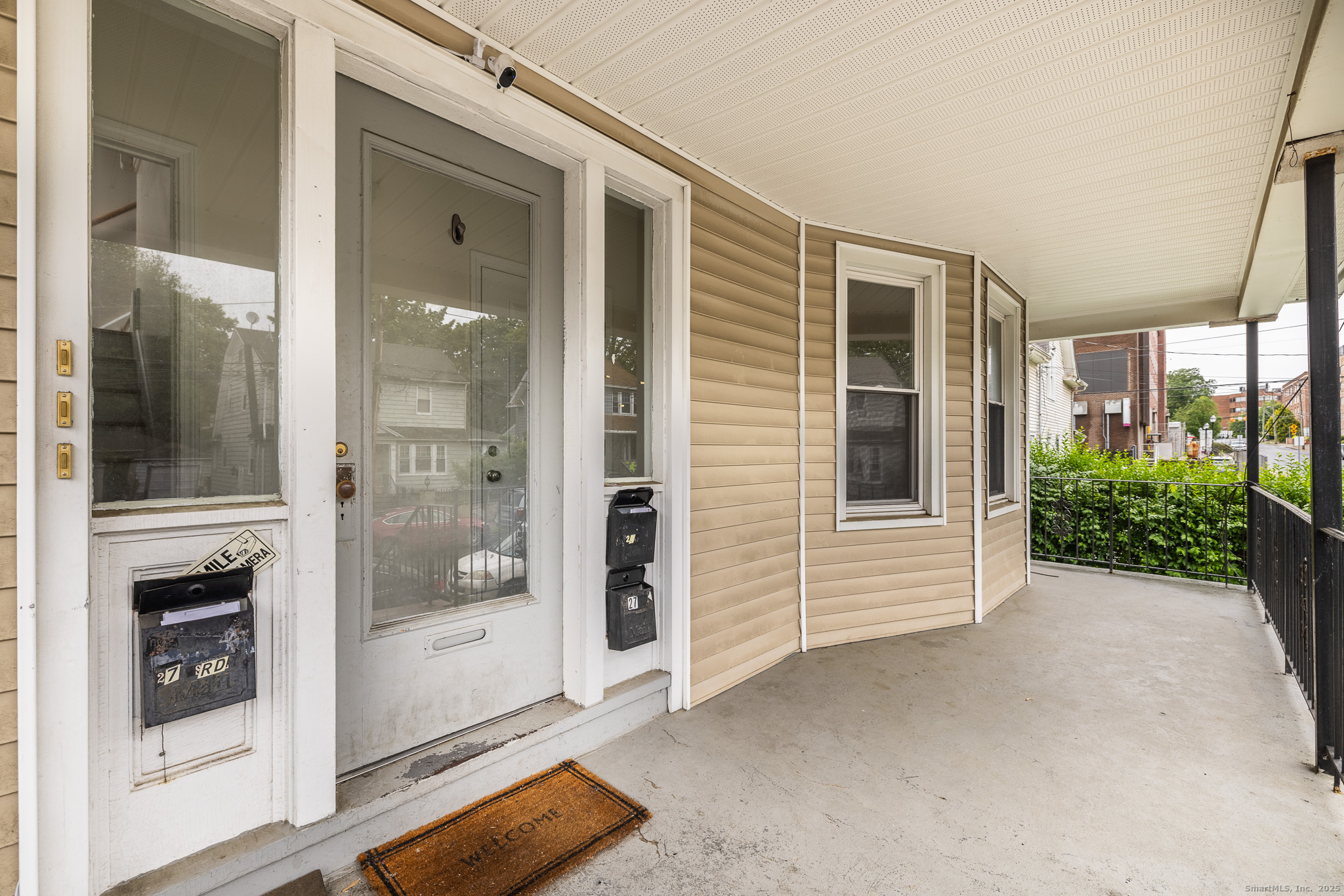 25 Hunting Street Bridgeport, CT 06606 - Photo 3 of 26 a view of front door and yard