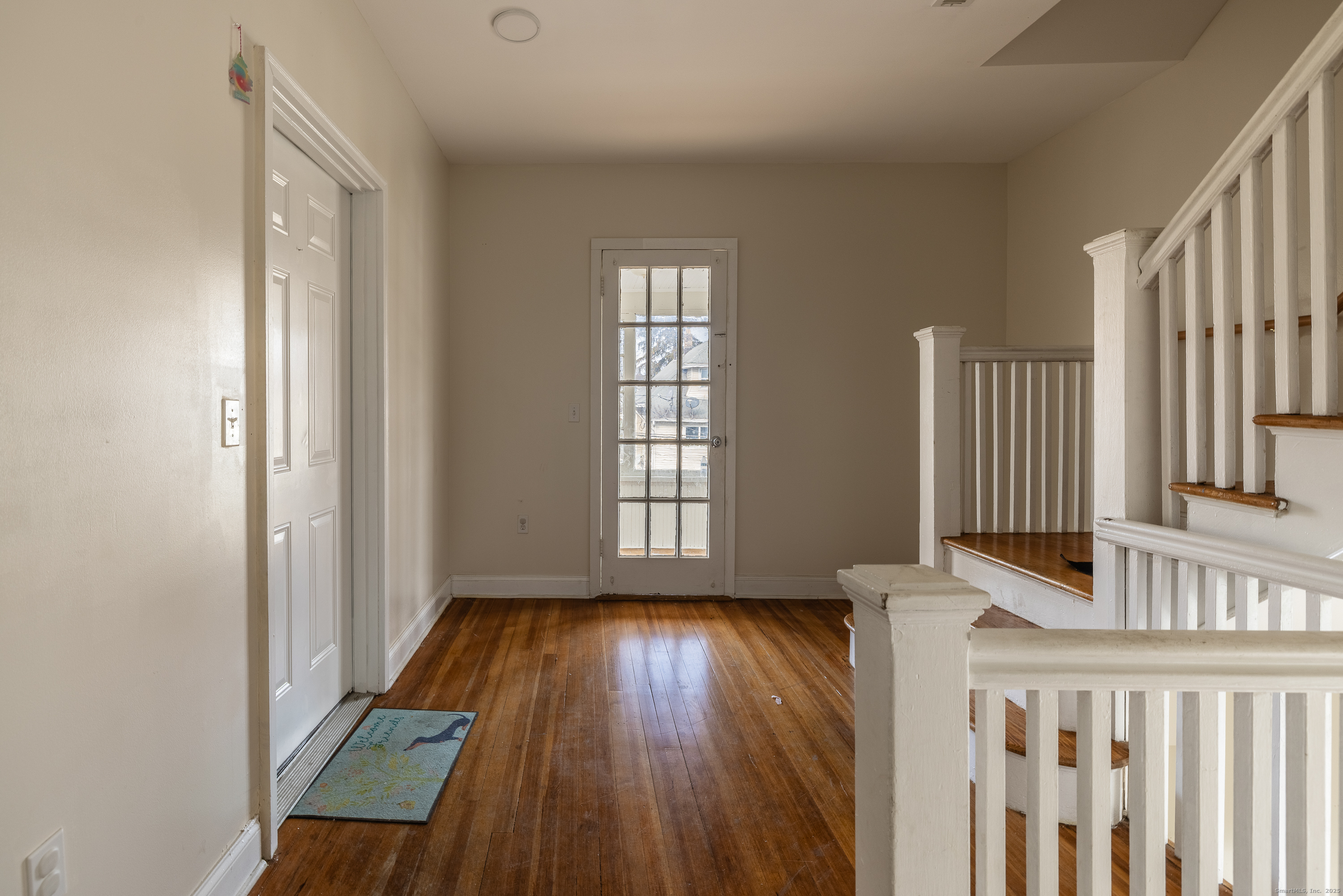 25 Hunting Street Bridgeport, CT 06606 - Photo 4 of 26 a view of wooden floor in a room