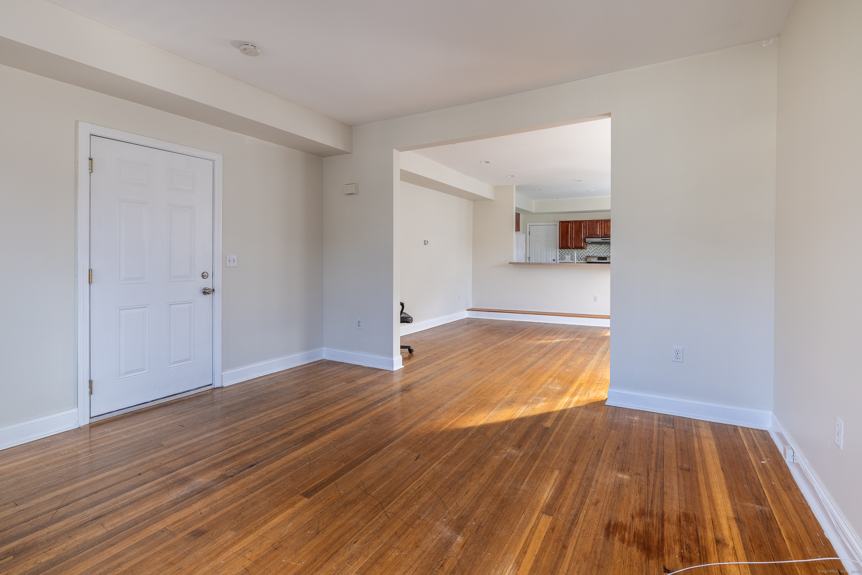 25 Hunting Street Bridgeport, CT 06606 - Photo 9 of 26 a view of empty room with wooden floor
