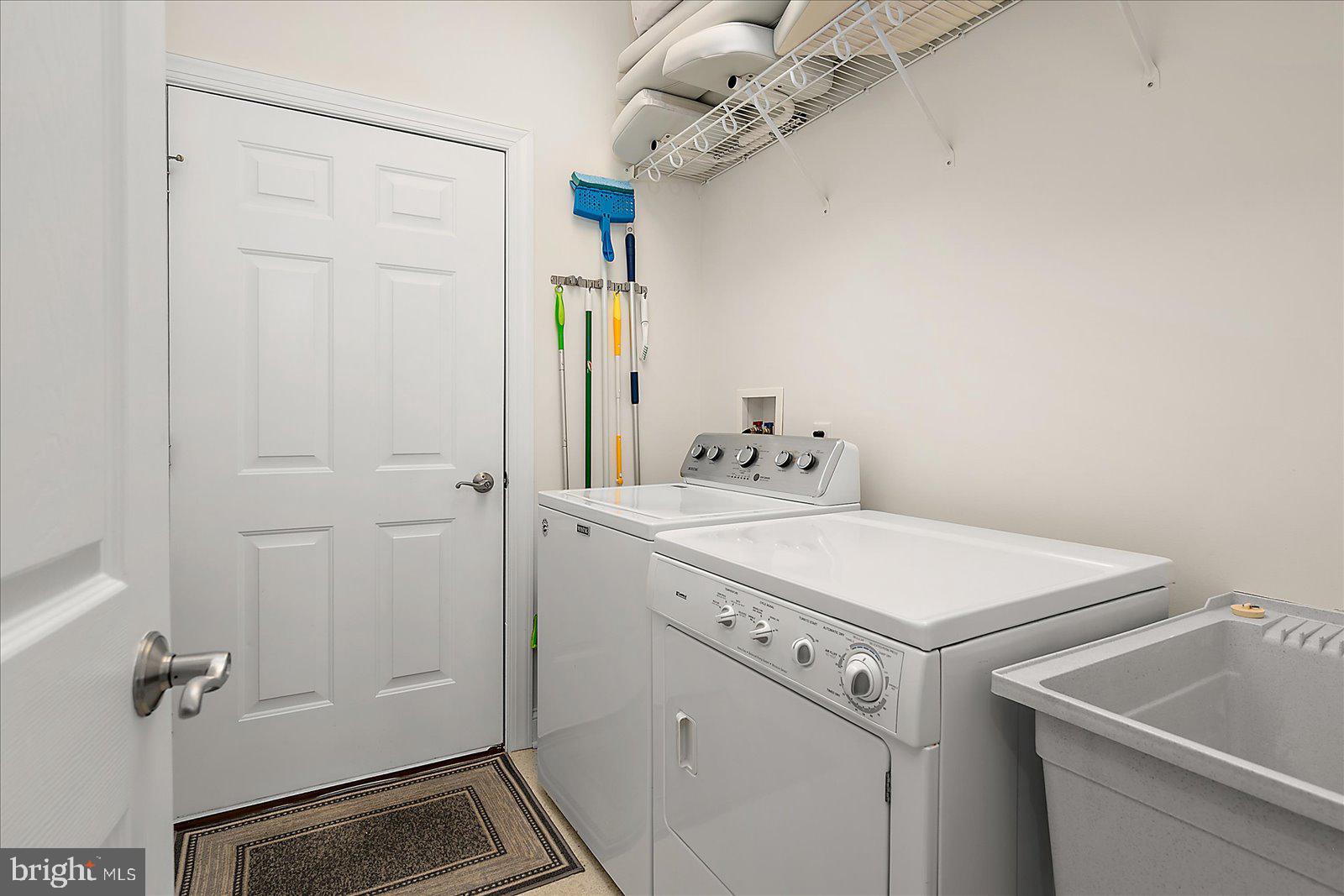 110 Waterview Lane Dagsboro, DE 19939 - Photo 49 of 100 Laundry room has sink and folding area