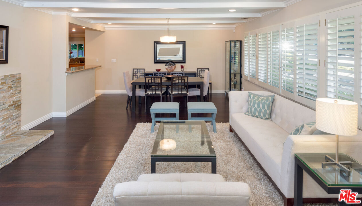 3632 Valley Meadow Road Sherman Oaks, CA 91403 - Photo 2 of 18 a living room with furniture and a large window