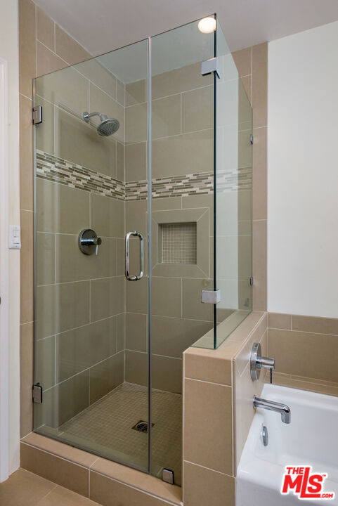3632 Valley Meadow Road Sherman Oaks, CA 91403 - Photo 15 of 18 a bathroom with a shower and a sink