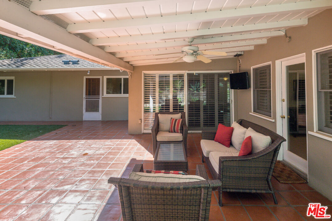 3632 Valley Meadow Road Sherman Oaks, CA 91403 - Photo 18 of 18 a outdoor space with patio the couches and a dining table with the view of the garden