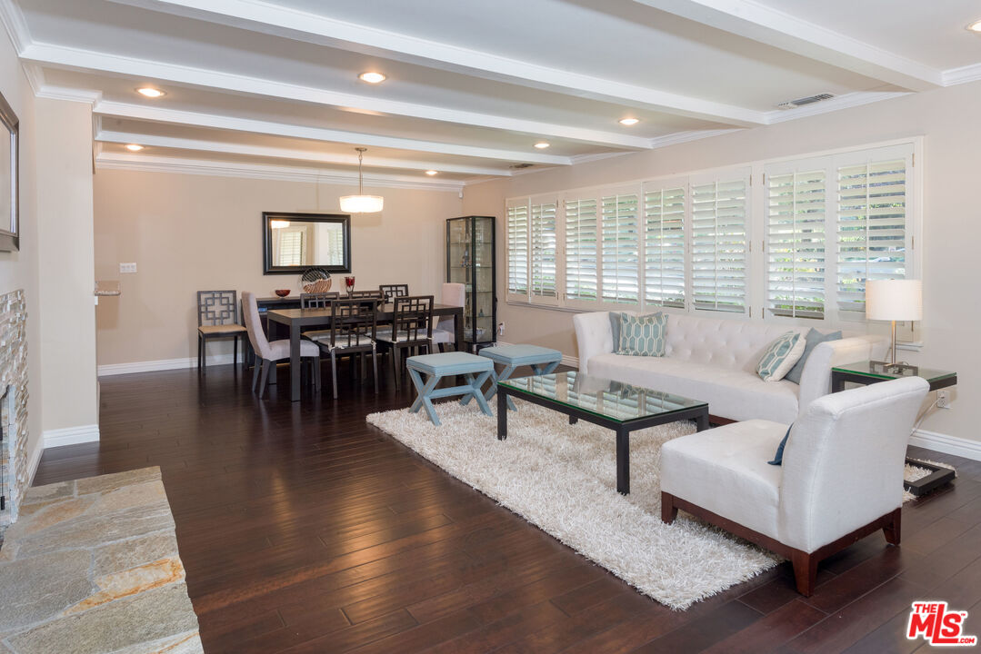 3632 Valley Meadow Road Sherman Oaks, CA 91403 - Photo 3 of 18 a living room with furniture and a large window