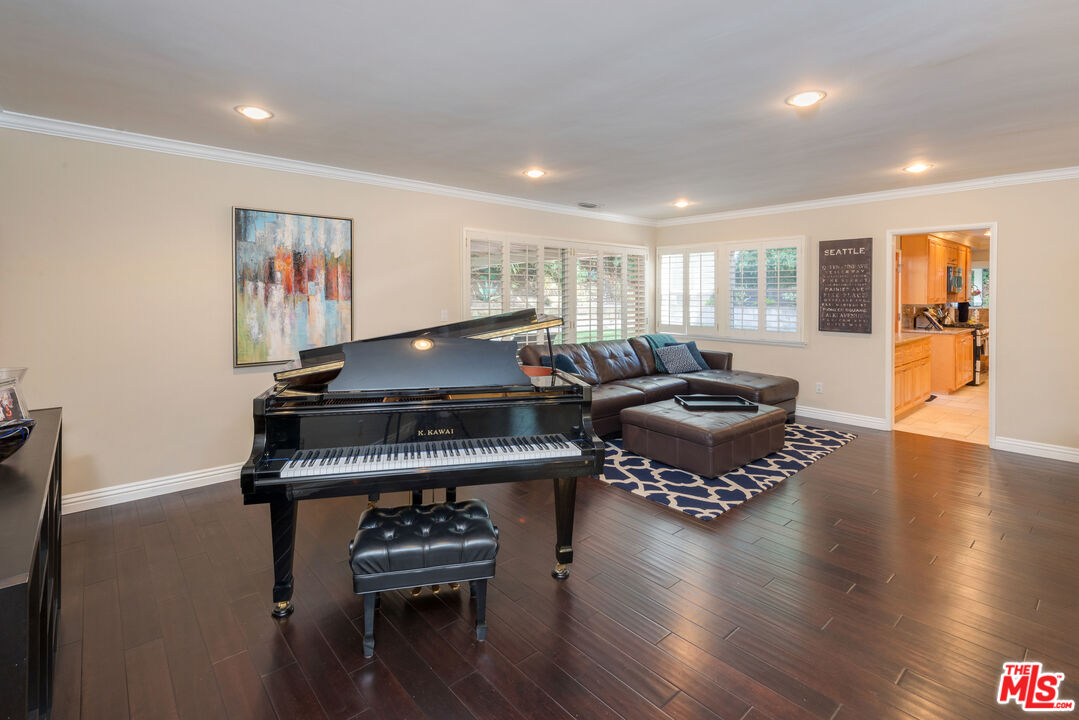 3632 Valley Meadow Road Sherman Oaks, CA 91403 - Photo 5 of 18 a living room with furniture and wooden floor
