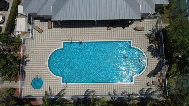 an aerial view of a highlighted house