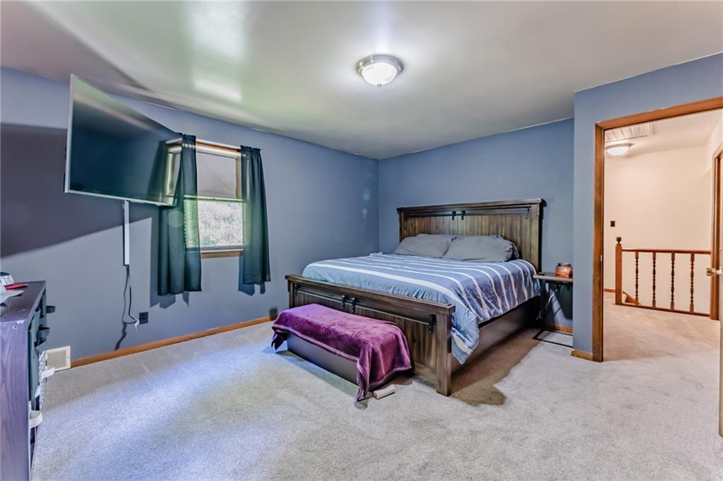 708 Margaret Road Kittanning, PA 16201 - Photo 14 of 25 a bedroom with a bed and a window