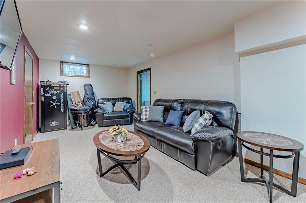 708 Margaret Road Kittanning, PA 16201 - Photo 22 of 25 a living room with furniture and a dining table