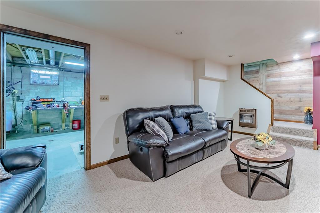 708 Margaret Road Kittanning, PA 16201 - Photo 23 of 25 a living room with furniture and a table