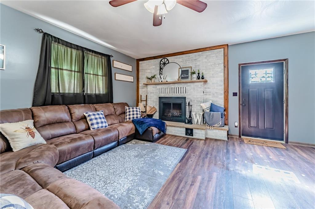 708 Margaret Road Kittanning, PA 16201 - Photo 10 of 25 a living room with furniture and a fireplace