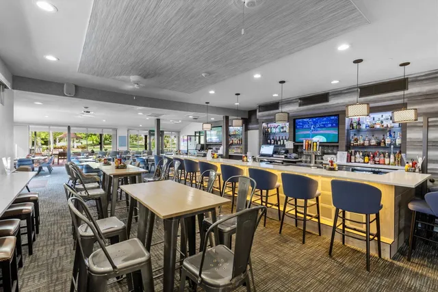 an aerial view of a house with a garden