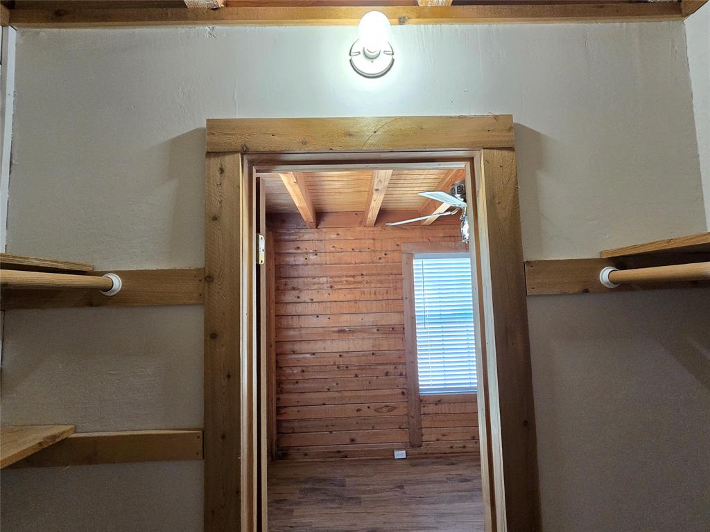 3505 Farmer Road Azle, TX 76020 - Photo 14 of 40 Walk-in closet in rear bedroom downstairs.