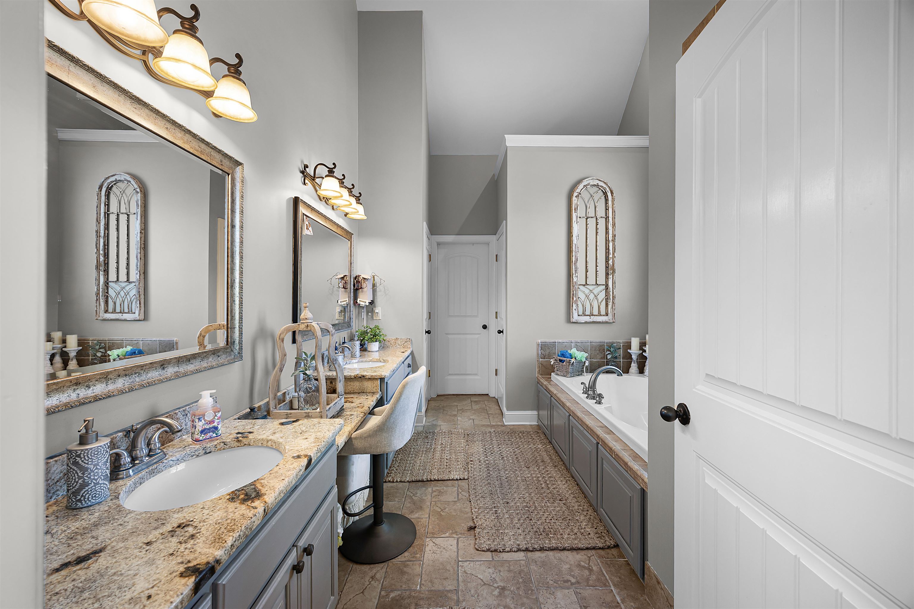 140 Legends Drive Counce, TN 38326 - Photo 18 of 30 Full bath with stone tile floors, vanity, and a bath