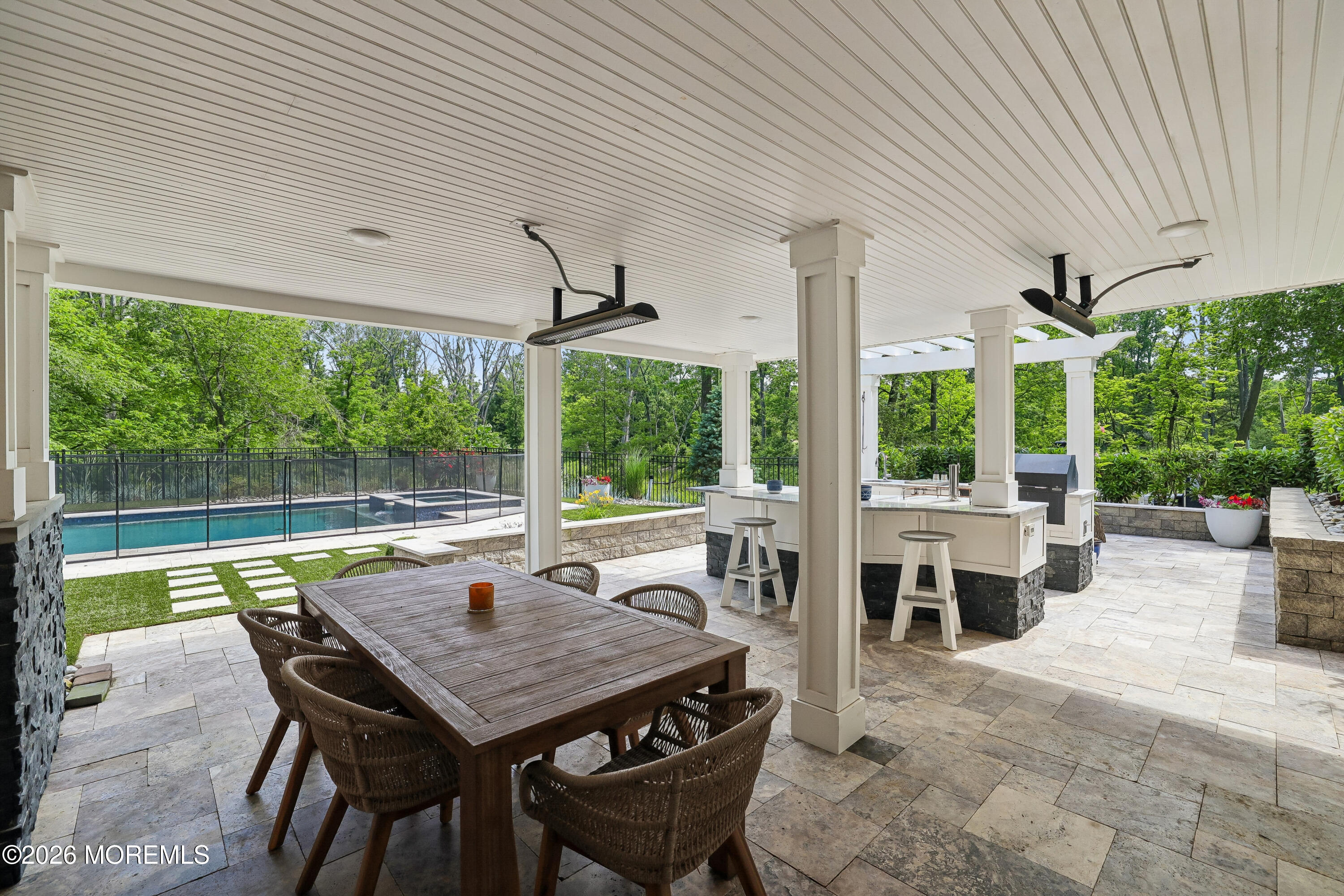 92 Tulip Lane Colts Neck, NJ 07722 - Photo 40 of 55 a view of a patio with a table chairs and a backyard