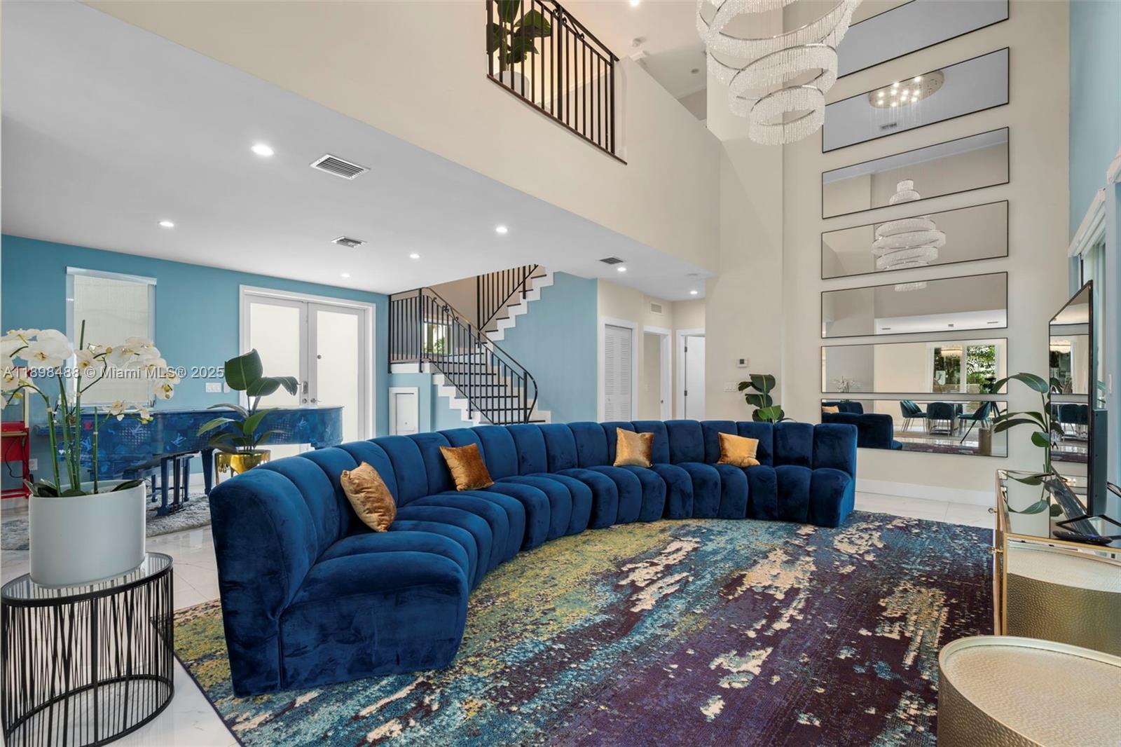 a living room with furniture or couch and a dining table