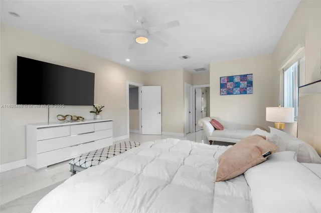 a bathroom with a bathtub and a sink