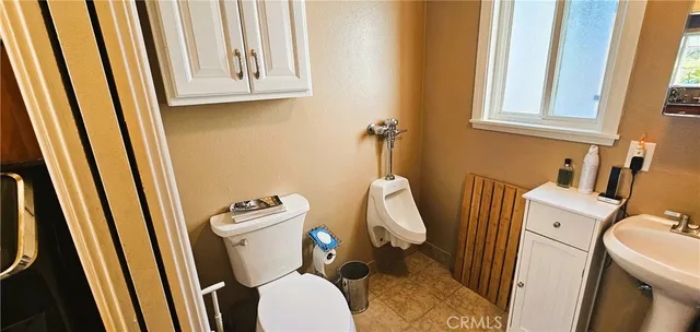 a bathroom with a sink and a toilet