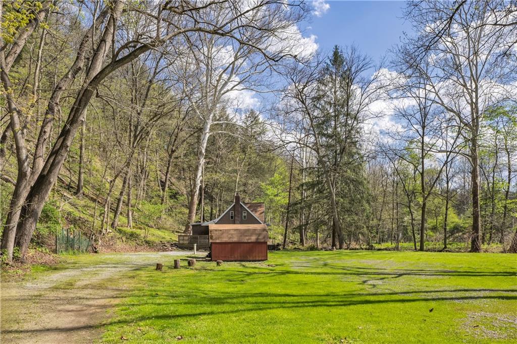 1360 Abers Creek Road Monroeville, PA 15146 - Photo 11 of 37 a view of a house with a big yard