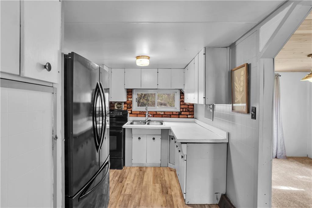 1360 Abers Creek Road Monroeville, PA 15146 - Photo 22 of 37 a kitchen with stainless steel appliances a refrigerator sink and microwave