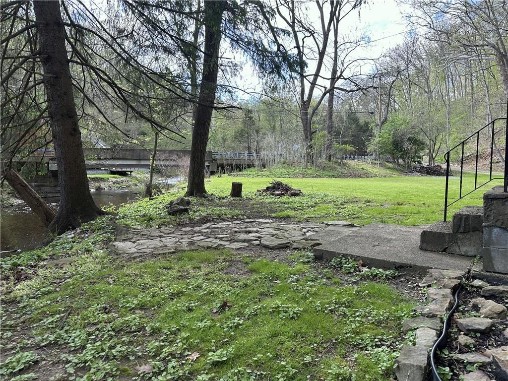 1360 Abers Creek Road Monroeville, PA 15146 - Photo 5 of 37 a backyard of a house with lots of green space