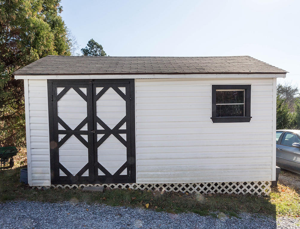101 Crest Court Blue Ridge, VA 24064 - Photo 27 of 35 a side view of a house with a yard