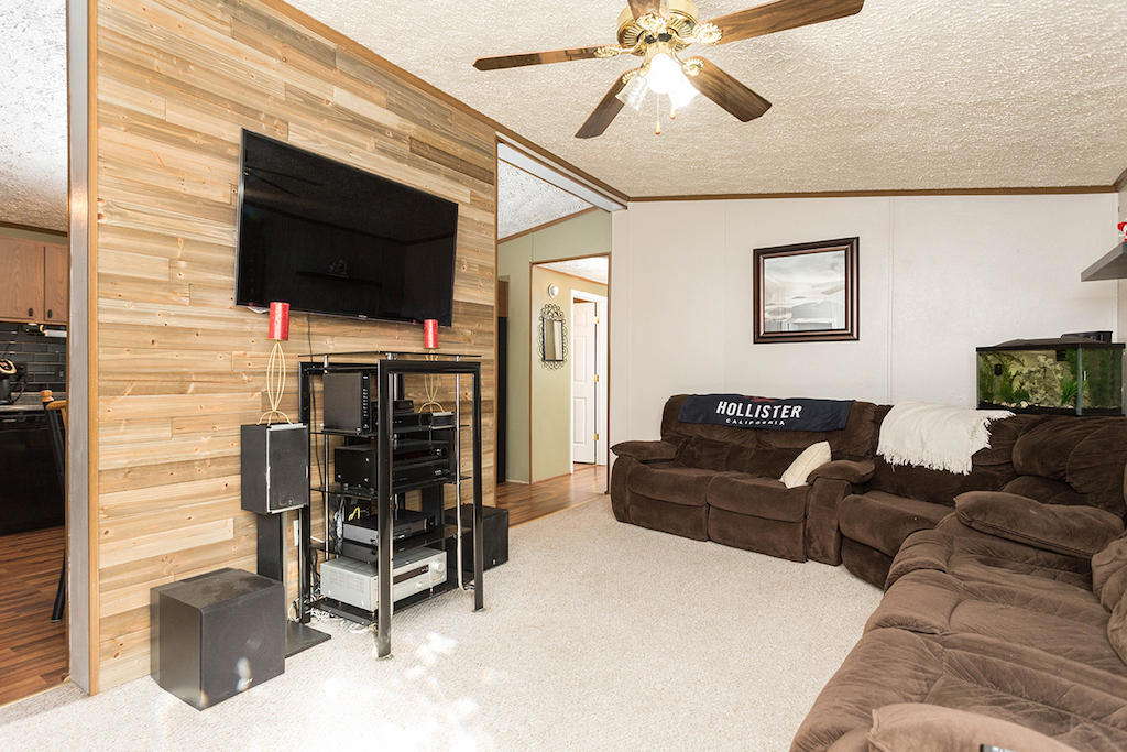 101 Crest Court Blue Ridge, VA 24064 - Photo 5 of 35 a living room with furniture and a flat screen tv