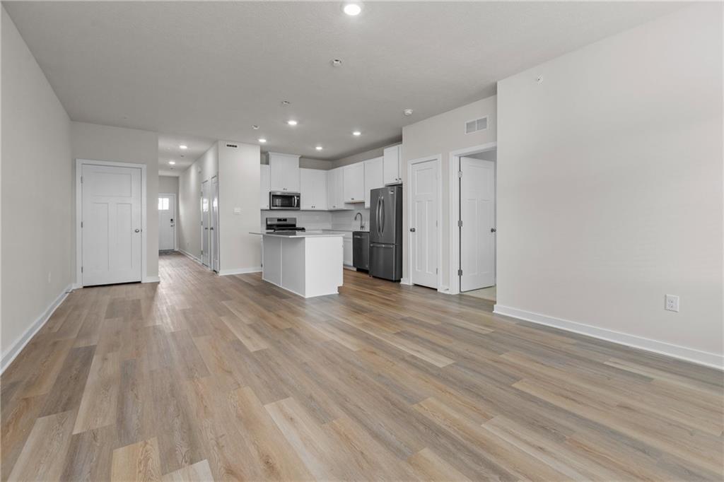 216 Hanover Lane Meadow Lands, PA 15347 - Photo 11 of 32 Main Level Living and dining areas.