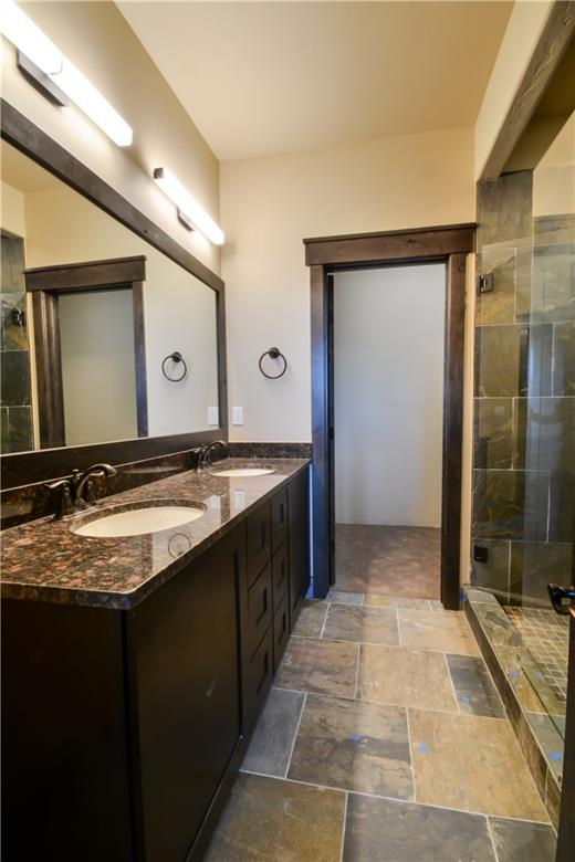854 Independence Road, Unit 3A Keystone, CO 80435 - Photo 22 of 25 a bathroom with a sink and a mirror