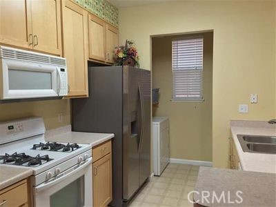 2177 Alum Rock Avenue, Unit 211 San Jose, CA 95116 - Photo 42 of 68 a kitchen with stainless steel appliances granite countertop a refrigerator and a stove