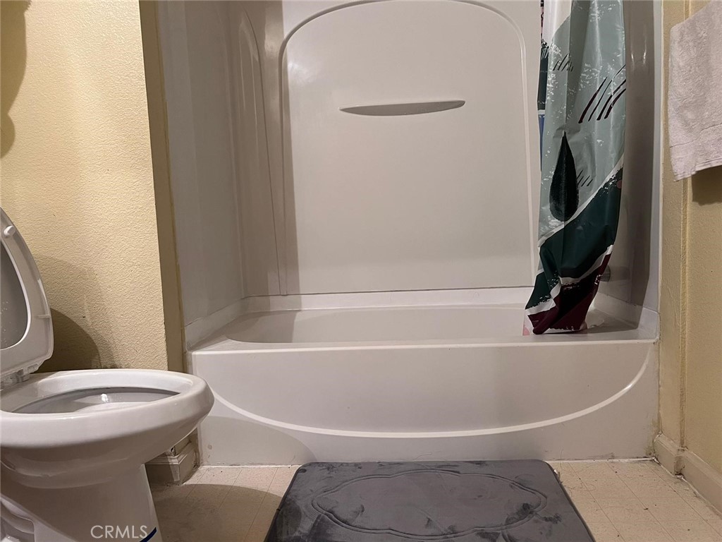 2177 Alum Rock Avenue, Unit 211 San Jose, CA 95116 - Photo 9 of 68 a white bath tub sitting next to a toilet