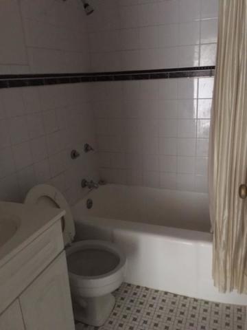 6030 North Sheridan Road, Unit 1207 Chicago, IL 60660 - Photo 6 of 10 a bathroom with a toilet and a shower