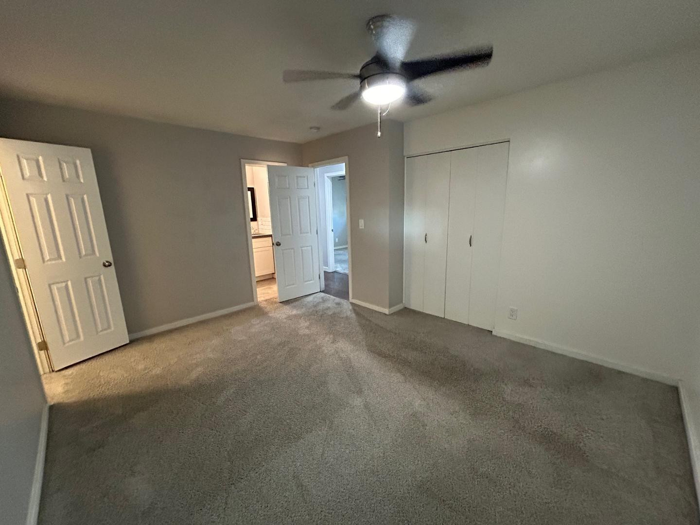 1117 West 9th Street Tempe, AZ 85281 - Photo 16 of 22 an empty room with staircase and mirror