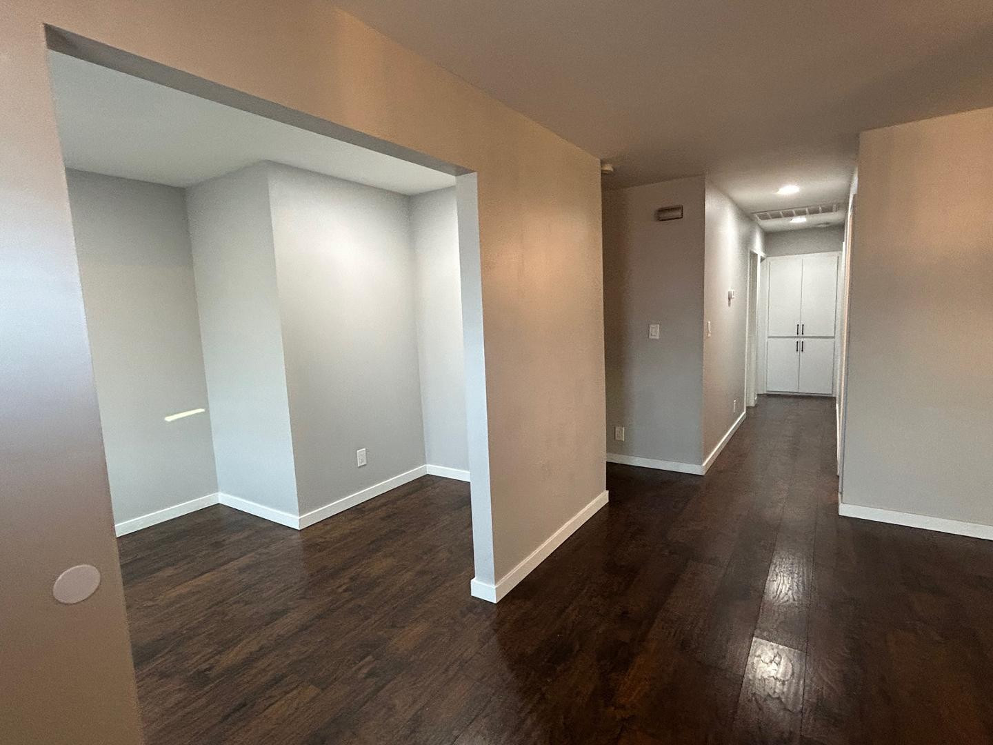 1117 West 9th Street Tempe, AZ 85281 - Photo 3 of 22 an empty room with wooden floor