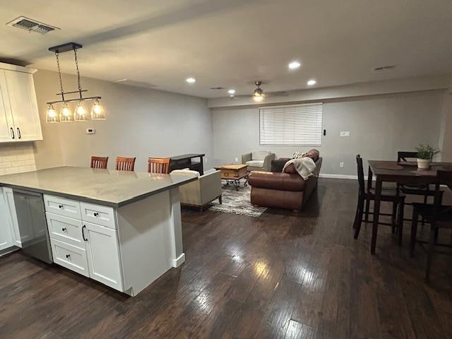 1117 West 9th Street Tempe, AZ 85281 - Photo 9 of 22 a living room with furniture and wooden floor