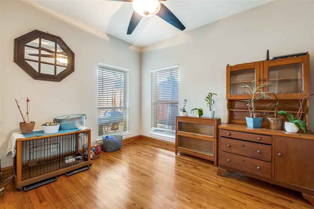 447 Josephine Street Dallas, TX 75246 - Photo 15 of 26 a living room with furniture and a wooden floor