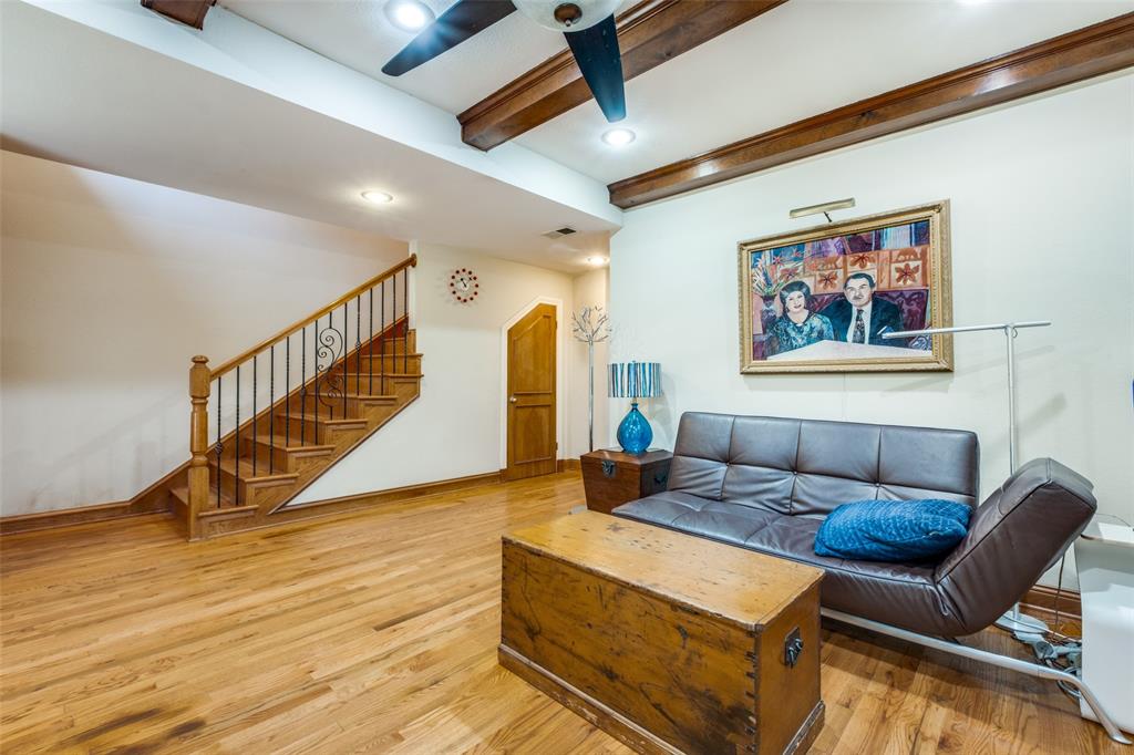 447 Josephine Street Dallas, TX 75246 - Photo 4 of 26 a living room with furniture and wooden floor