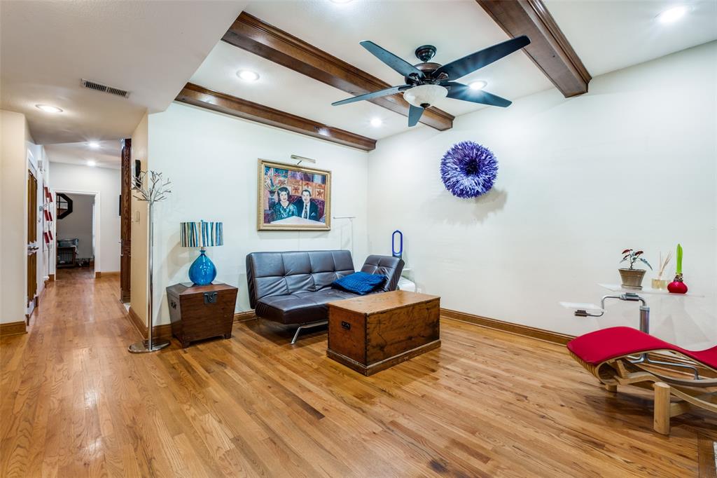 447 Josephine Street Dallas, TX 75246 - Photo 7 of 26 a living room with furniture and a wooden floor