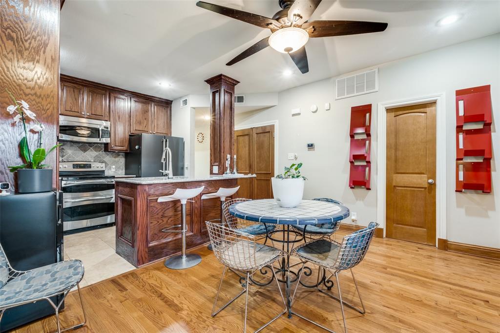 447 Josephine Street Dallas, TX 75246 - Photo 9 of 26 a view of a dining room with furniture