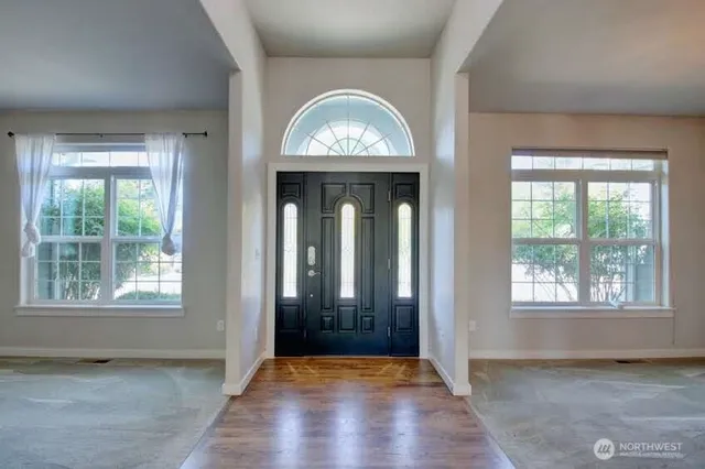 an empty room that has a window