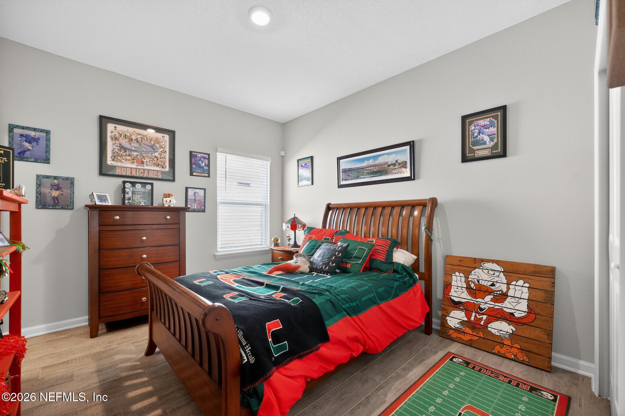 75505 Banyan Way Yulee, FL 32097 - Photo 18 of 30 a bed room with bed and furniture