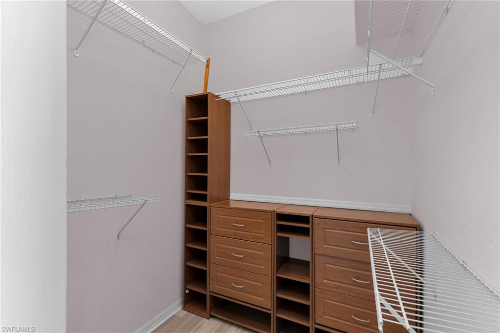 2880 Orange Grove Trail Naples, FL 34120 - Photo 16 of 42 a view of walk in closet