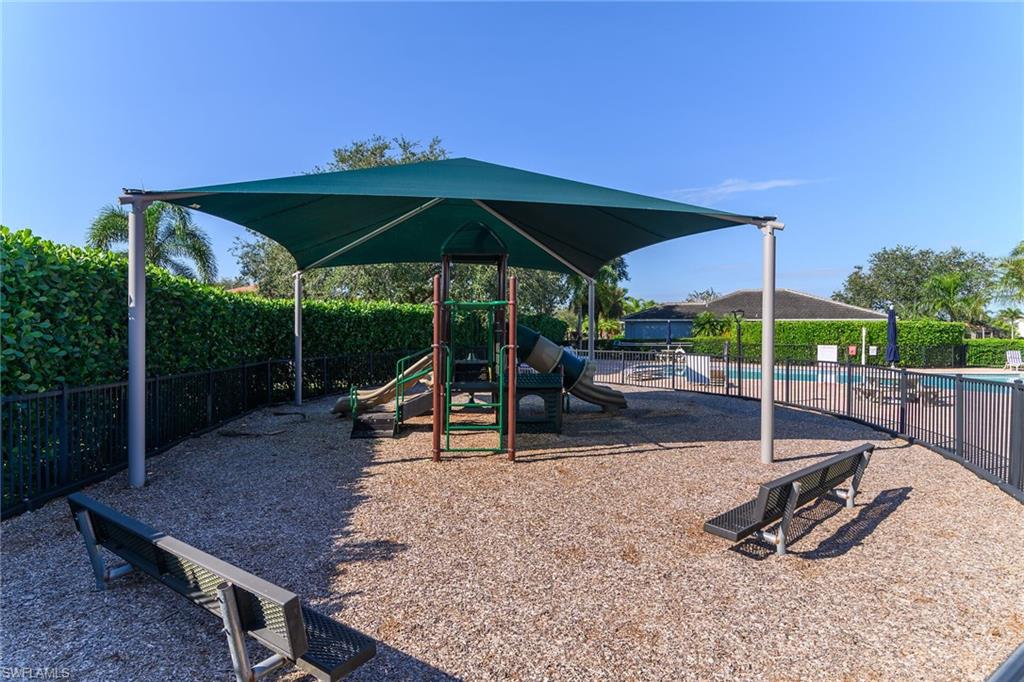 2880 Orange Grove Trail Naples, FL 34120 - Photo 29 of 42 a view of a park with a slide
