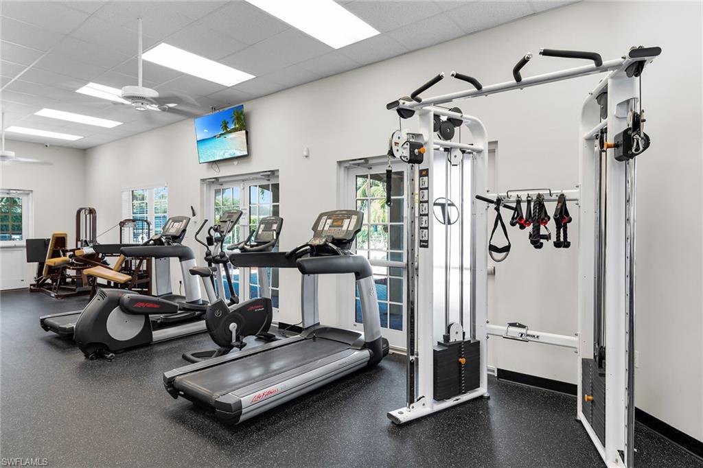 2880 Orange Grove Trail Naples, FL 34120 - Photo 30 of 42 a view of a room with gym equipment